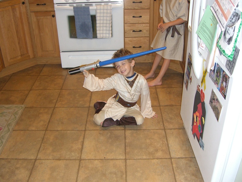 cameron-gets-the-jedi-robes-to-match-his-lightsaber_5021561243_o.jpg