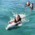 callie-gets-a-dolphin-ride 8430451494 o