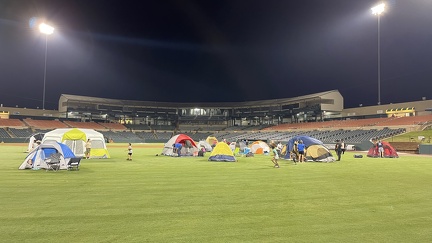 A view of the tents from the outfield