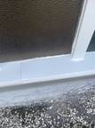Caulking around the window flashing